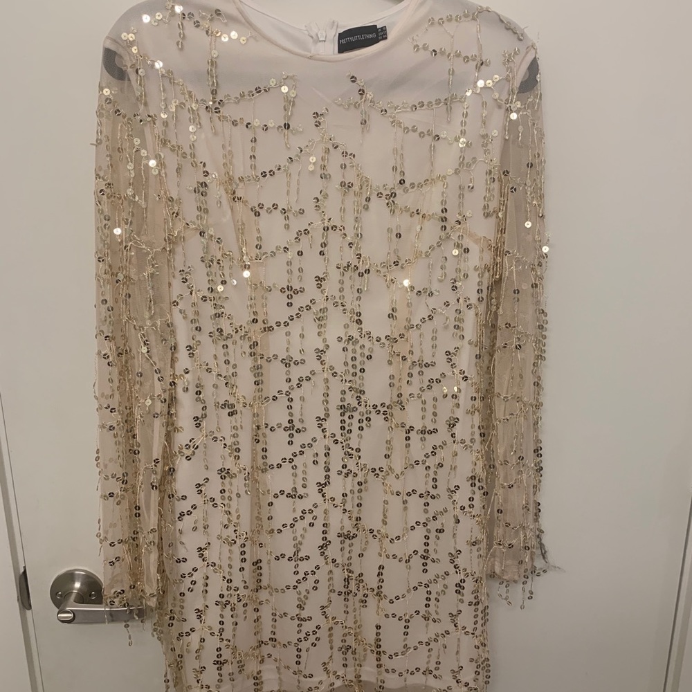 White and gold sequin dress with mesh sleeves
